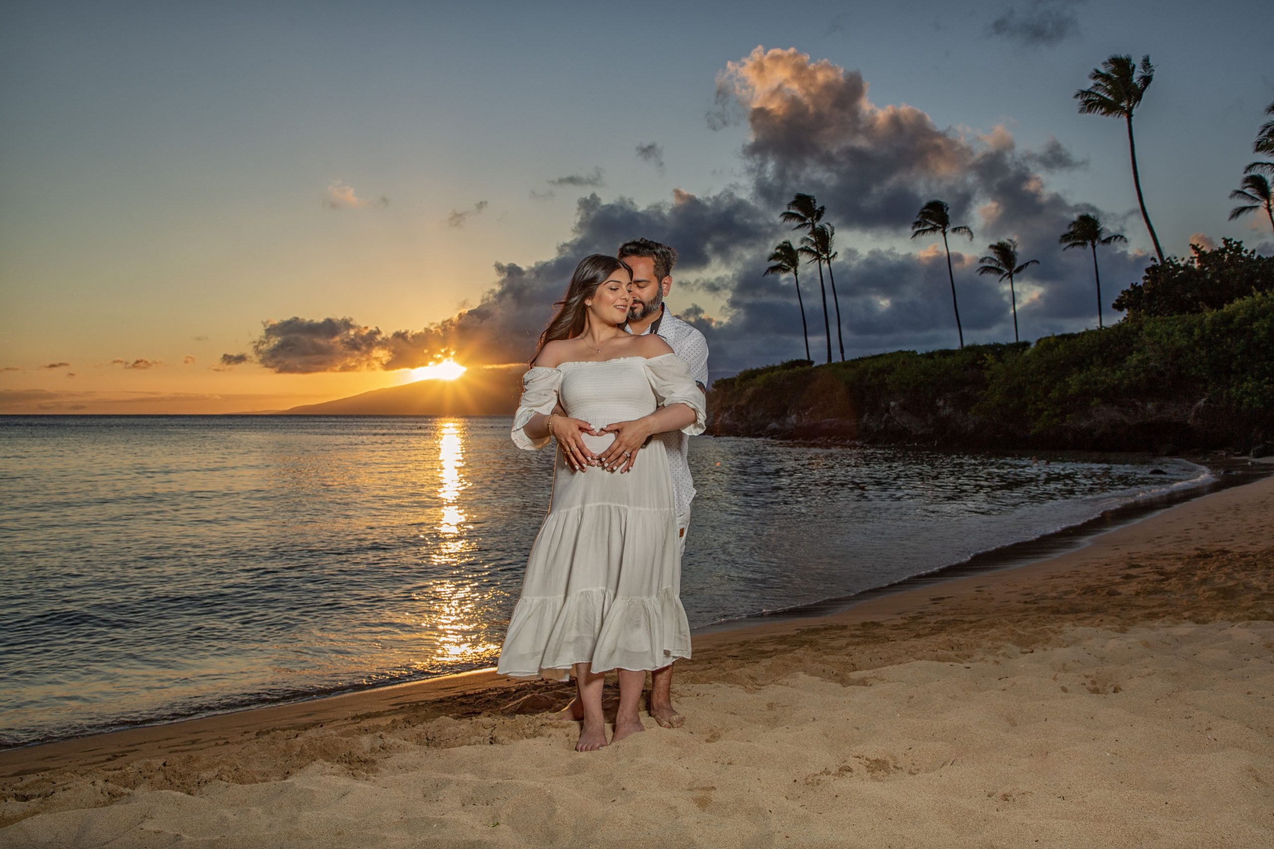 Couple embracing at sunset on a beach